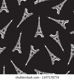 Seamless pattern. Modern design print fabric. Illustration white ink Eiffel Tower. Abstract ornament hand drawing. Vector illustration is isolated on a black background.