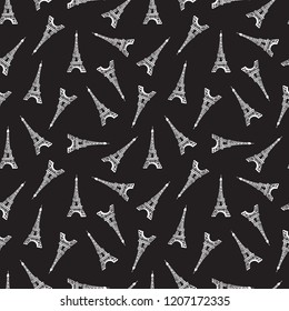 Seamless pattern. Modern design print fabric. Illustration white ink Eiffel Tower. Abstract ornament hand drawing. Vector illustration is isolated on a black background.
