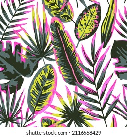 Seamless pattern with modern neon tropical leaves and plants for design and textile.