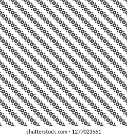 Seamless pattern. Modern simple texture. Regularly repeating diagonal ornament with small dots, circles. Vector element of graphical design