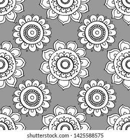 seamless pattern in monochrome colors, with ethnic ornaments in flowers