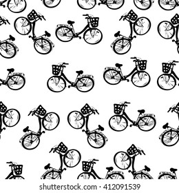 seamless pattern of a monochrome vector illustration of antique french, lady's bicycles