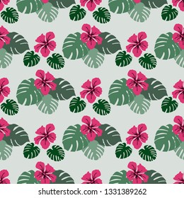 Seamless pattern with monstera leaves and hibiscus flowers. Tropical background. Design for banner, poster, textile, print.