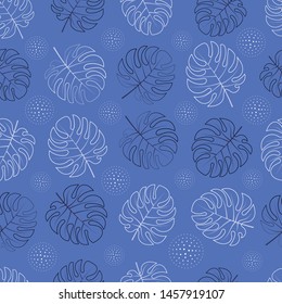 seamless pattern of monstera leaves on blue background