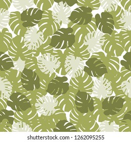 Seamless pattern with monstera leaves. Tropical background. Design for banner, poster, textile, print.