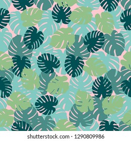 Seamless pattern with monstera leaves. Tropical background. Design for banner, poster, textile, print.
