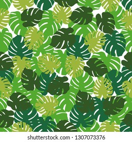 Seamless pattern with monstera leaves. Tropical background. Design for banner, poster, textile, print.