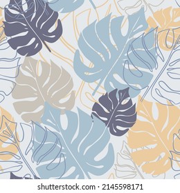 Seamless pattern of monstera leaves in yellow and blue shades. Vector illustration for fabric, wrapping paper or wallpaper.