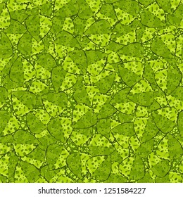 Seamless pattern. The motley green leaves are scattered randomly against a background of abstract texture. Camouflage style.