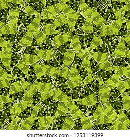 Seamless pattern. Motley green maple leaves lying on a background of square suns. Camouflage.