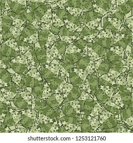 Seamless pattern. The motley-green leaves of maple lying on a background of coarse and openwork weaving. Camouflage.