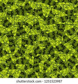 Seamless pattern. Motley-green leaves in random order are placed on a substrate of a grid. Camouflage style.