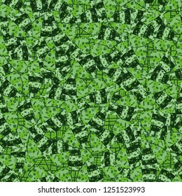 Seamless pattern. Motley-green leaves in random order are placed on a substrate of a grid. Camouflage style.