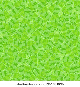Seamless pattern. Motley-green leaves in random order are placed against the background of the wood-parquet texture. Camouflage style.