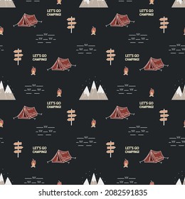 Seamless pattern with mountains, tents and a campfire. Camping concept. For printing on fabrics, notebooks and other purposes.
