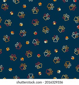 Seamless pattern with muliticolor contour cat footprint on blue background. Vector