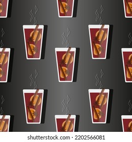 Patrón inmaculado con vino a la parrilla con estrella de anís, canela y rodajas de naranja en un vaso transparente con vapor sobre fondo negro. Bebida caliente en invierno. 