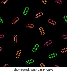 Seamless pattern. Multicolor paper clips on the black background