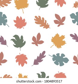 Seamless pattern, multicolored autumn leaves on a white background in vector graphics. For the decorating wallpaper, wrapping paper, prints on clothes, textiles, bed linen.