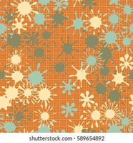 Seamless pattern. Multi-colored blots on a plaid background. Grungy textiles. Wallpaper for children. Flat. Cartoon.