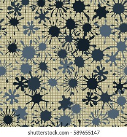 Seamless pattern. Multi-colored blots on a plaid background. Grungy textiles. Wallpaper for children. Flat. Cartoon.