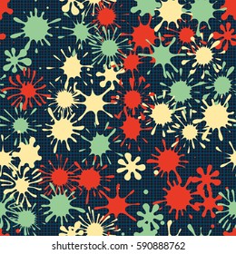 Seamless pattern. Multi-colored blots on a plaid background. Grungy textiles. Wallpaper for children. Flat. Cartoon.
