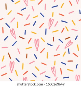 seamless pattern with multicolored confetti and hearts. Background Pattern. Covering confectionery. colored caramel, lollipops. multicolored sticks. Memphis Pattern. decoration.