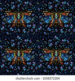 Seamless pattern. Multicolored Dead head butterfly in a night flower garden. Moth among flowers and leaves. Ideal for decoration of Halloween and the Day of the Dead.