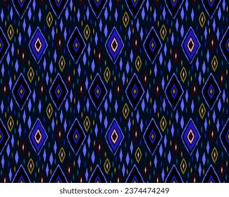 Seamless pattern with multicolored diamonds. Geometric chevron abstract illustration, wallpaper. Tribal ethnic vector texture. Aztec style. Folk embroidery. Indian, Scandinavian, African rug.