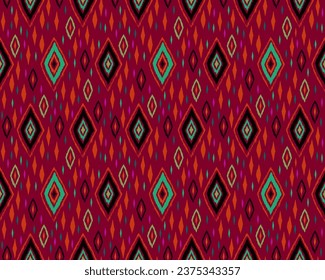 Seamless pattern with multicolored diamonds. Geometric chevron abstract illustration, wallpaper. Tribal ethnic vector texture. Aztec style. Folk embroidery. Indian, Scandinavian, African rug.
