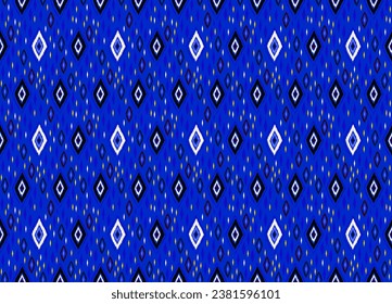 Seamless pattern with multicolored diamonds. Geometric chevron abstract illustration, wallpaper. Tribal ethnic vector texture. Aztec style. Folk embroidery. Indian, Scandinavian, African rug.