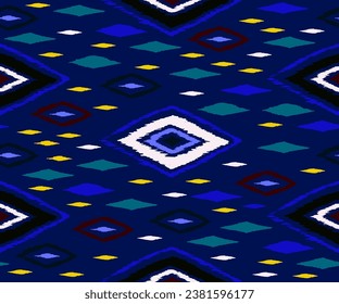 Seamless pattern with multicolored diamonds. Geometric chevron abstract illustration, wallpaper. Tribal ethnic vector texture. Aztec style. Folk embroidery. Indian, Scandinavian, African rug.