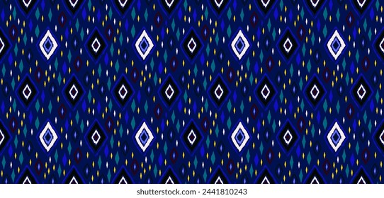 Seamless pattern with multicolored diamonds. Geometric chevron abstract illustration, wallpaper. Tribal ethnic vector texture. Aztec style. Folk embroidery. Indian, Scandinavian, African rug.