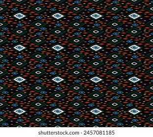Seamless pattern with multicolored diamonds. Geometric chevron abstract illustration, wallpaper. Tribal ethnic vector texture. Aztec style. Folk embroidery. Indian, Scandinavian, African rug.