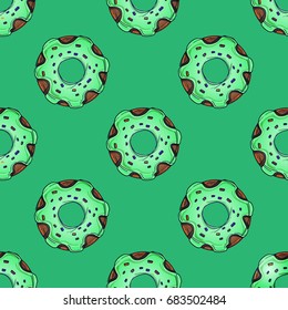 Seamless pattern from multi-colored donuts in a cartoon style. Background for baking packaging design.