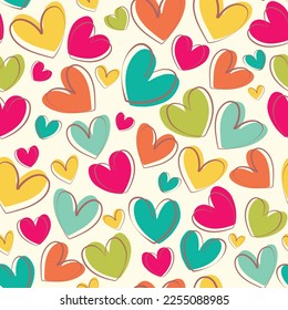 Seamless pattern. Multicolored hearts. Bright pattern for fabrics, packaging backgrounds. Doodle hearts. Seamless vector pattern on white background.
