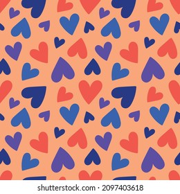 Seamless pattern of multicolored hearts on a orange background. Vector illustration