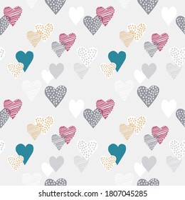 seamless pattern, multi-colored hearts in stripes and polka dots, hand-drawn on a light gray background