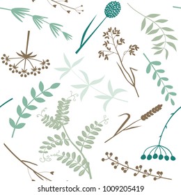 Seamless pattern from multi-colored leaves, twigs. Garden and field grass.