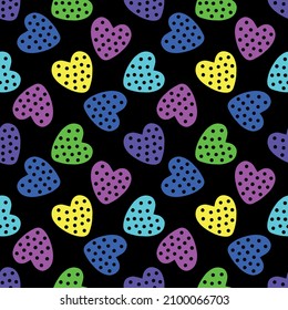 Seamless pattern with multi-colored neon hearts on a black background. Vector illustration