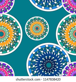 Seamless pattern with multicolored ornamented balls on a blue background. Vector illustration