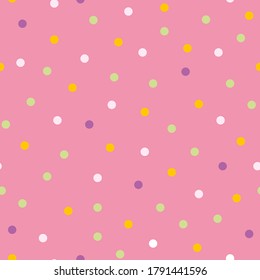 Seamless pattern. Multicolored polka dots against bright background. Vector chaotically repeating round textures.