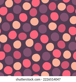 Seamless pattern with multicolored polka dots of arbitrary shape on a dark background. Endless sprint with pink and purple abstract circles