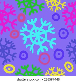 Seamless pattern of multicolored snowflakes, bagels on a blue background. Handmade.