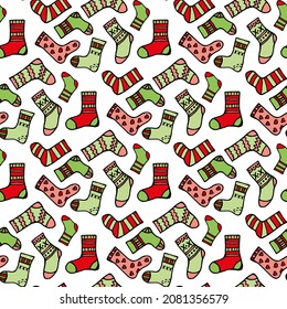Seamless pattern of multicolored socks on white background. Vector image.
