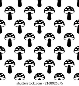 Seamless pattern with mushrooms. Black icon of mushrooms on white background. Isolated symbol mushroom in flat style. Design for print on fabric, wrapping paper, packing, wallpaper.Vector illustration