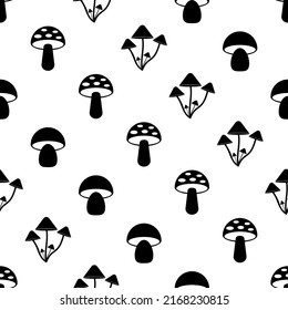 Seamless pattern with mushrooms. Black icon of mushrooms in white background. Collection mushroom in flat style. Design for print on fabric, wrapping paper, packing, wallpaper. Vector illustration