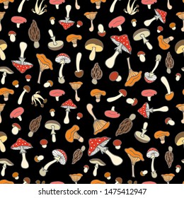 Seamless pattern with mushrooms. Mushroom pattern on black background.Bright colorful mushrooms.For decorative fabrics, Wallpaper,packaging and paper.Flat style.Vector file.