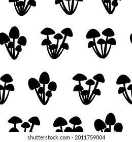 Seamless pattern mushrooms silhouettes vector illustration