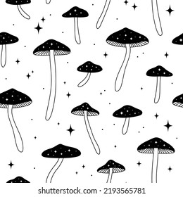 Seamless pattern with mushrooms and stars. Celestial background. Hand drawn vector illustration. Black and white.